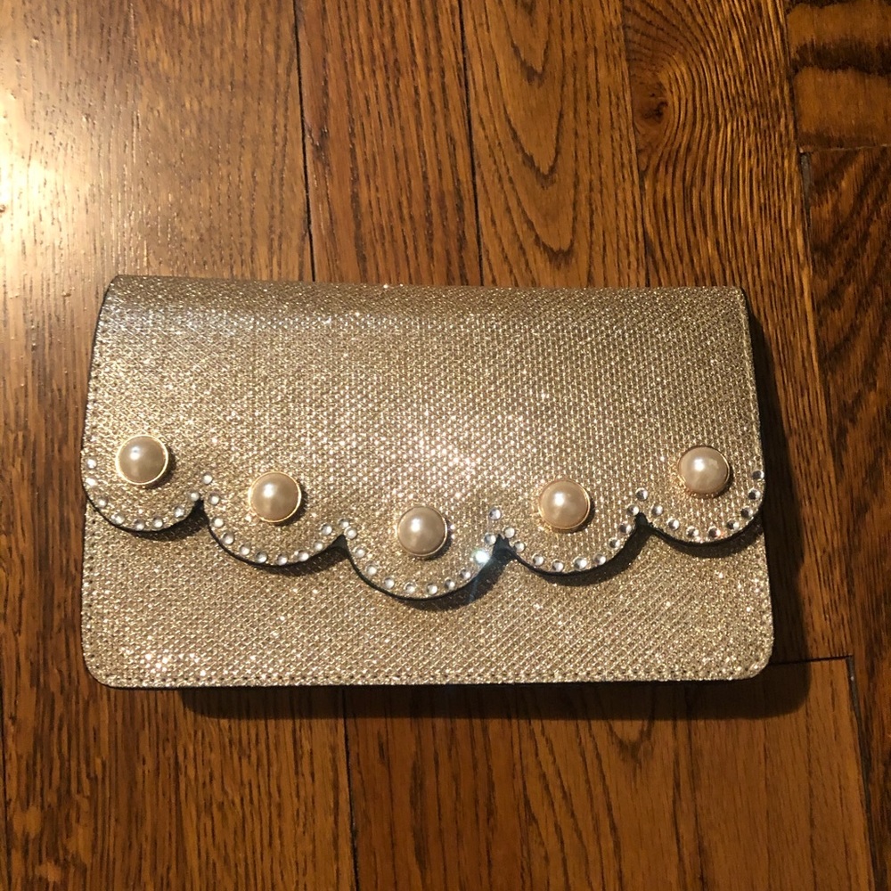 Women’s gold clutch